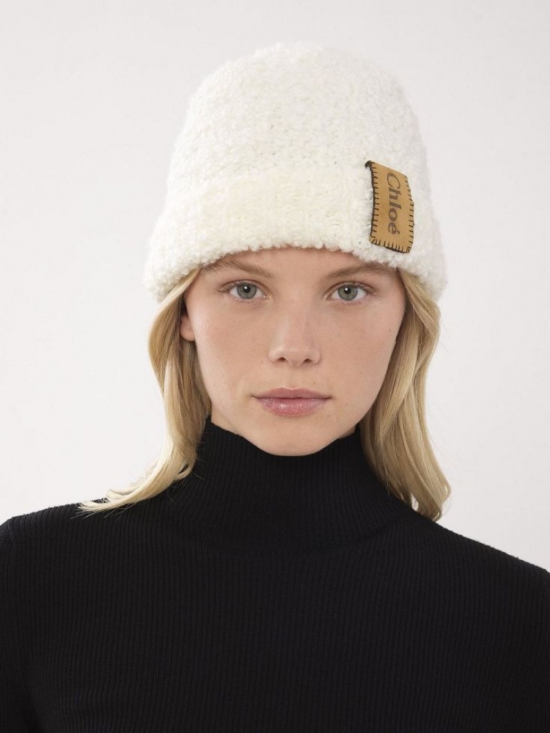 Chloe Curly Knit Beanie Hatt Beige | CHE-SR14475