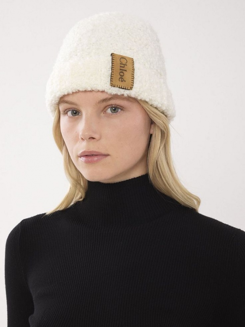 Chloe Curly Knit Beanie Hatt Beige | CHE-SR14475